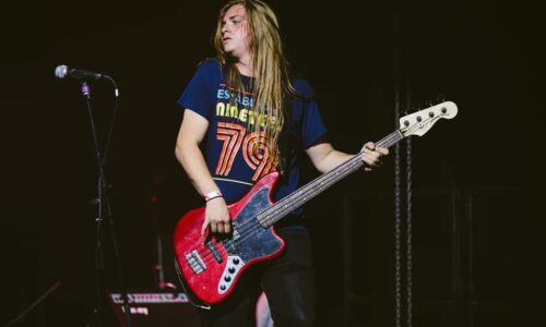 Casey playing the bass guitar