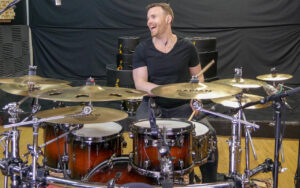 Duncan playing his Mapex Black Panther drum Kit