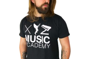 Max wearing the XYZ Music Academy T-Shirt in black and white