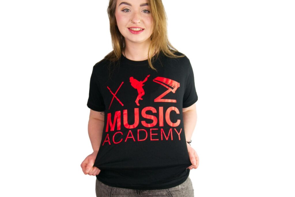 Jess wearing the XYZ Music Academy T-Shirt