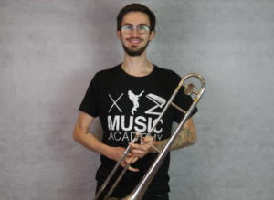 Chris holding the trombone
