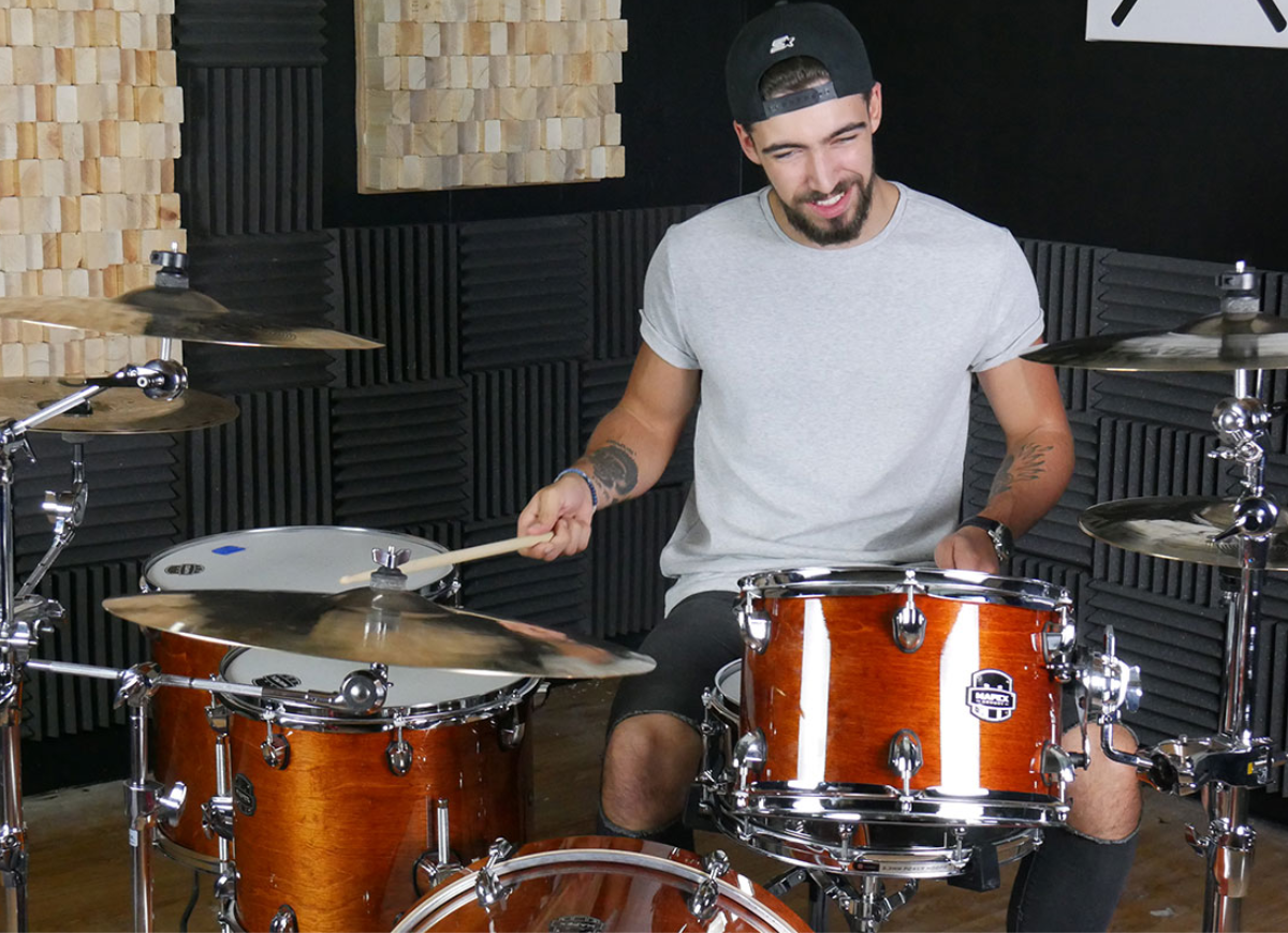 Max playing the drums